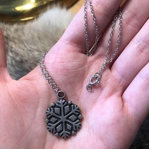 Swedish pewter snowflake pendant on silver toned chain